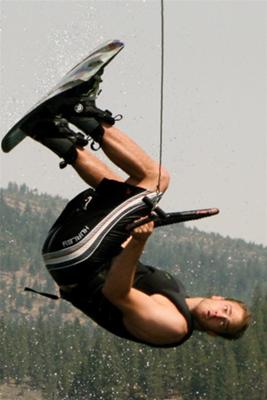 Me throwing down a back roll on the wakeboard